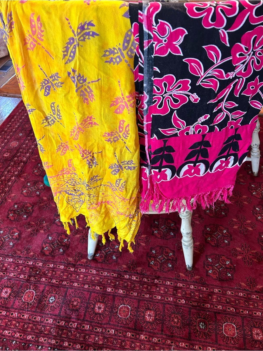 Several sarongs beach cover ups.